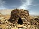 The earliest stone-built tombs which can be called 'beehive', are in Oman, built of stacked flat stones which occur in nearby geological formations. They date to between 3,500 and 2,500 years BC, to a period when the Arabian peninsula was subject to much more rainfall than now, and supported a flourishing civilisation in what is now desert, to the west of the mountain range along the Gulf of Oman.<br/><br/>

No burial remains have ever been retrieved from these 'tombs', though there seems no other purpose for their building. They are built entirely above ground level and the entrances are usually an undifferentiated part of the circular walling of the tomb.